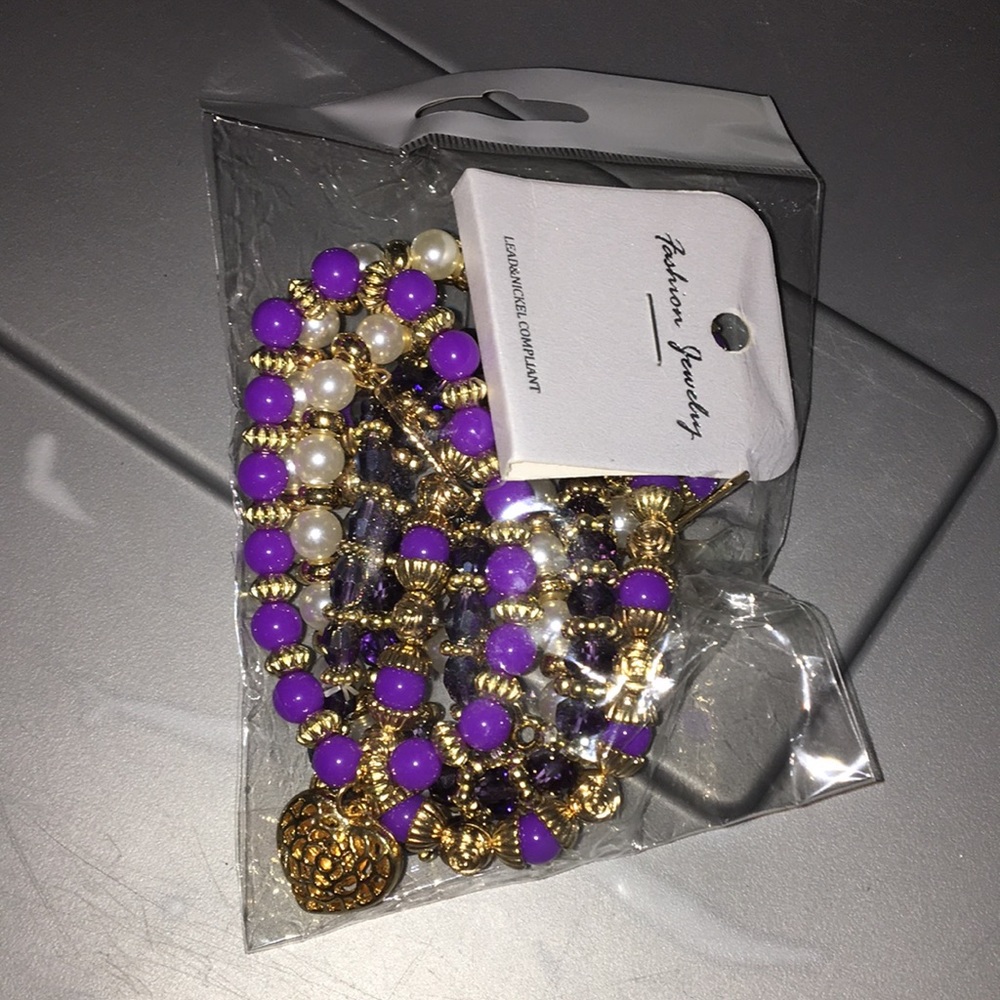 Mixed color handmade bracelet with charms